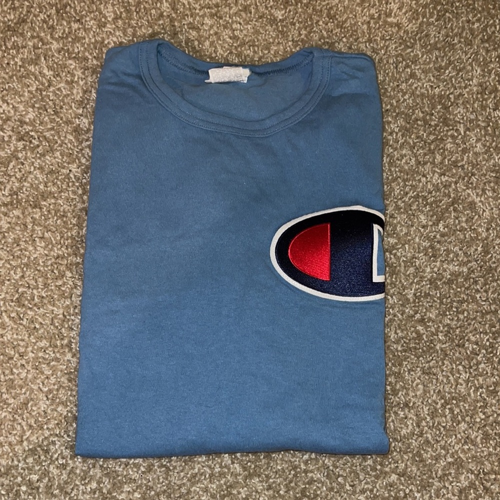 Champion men’s large T-shirt with large logo.
